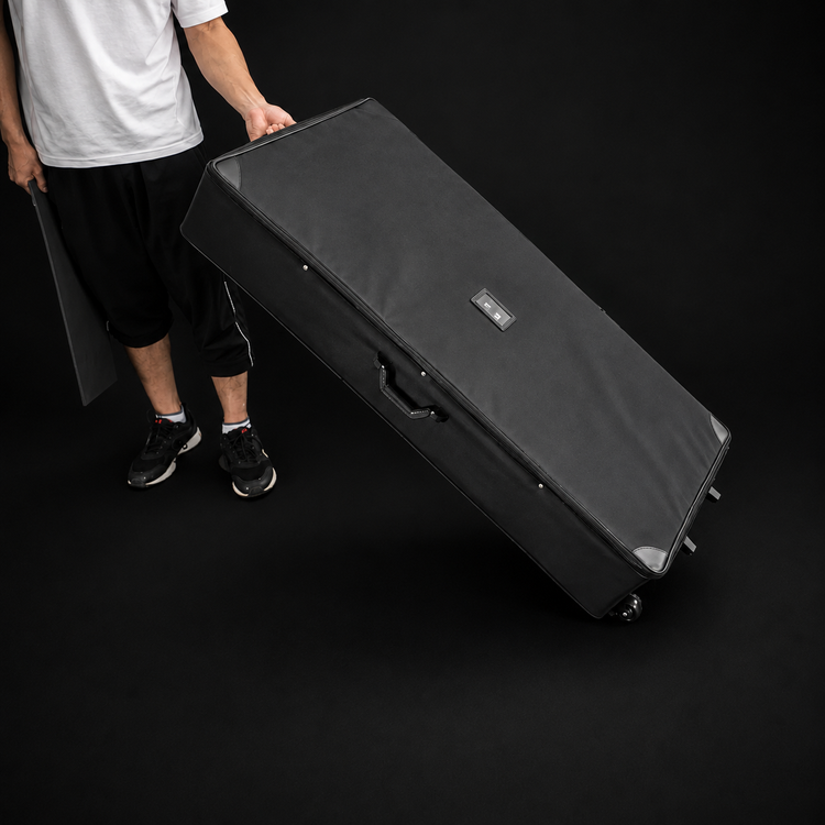 Padded rolling travel case with wheels, zippered top and carry handles